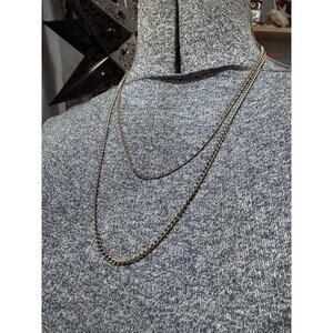 Gold tone long necklace